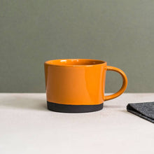 Load image into Gallery viewer, Black Clay Mug dipped in Orange