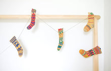 Load image into Gallery viewer, East End Press - FESTIVE STOCKINGS SEWN GARLAND
