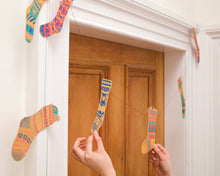 Load image into Gallery viewer, Festive Stockings Sewn Garland
